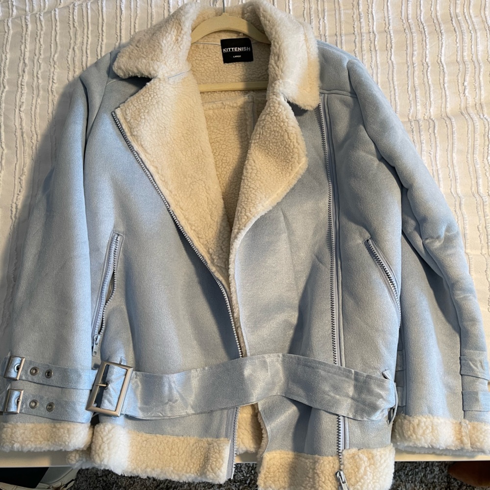 Super cute kittenish jacket in light blue.